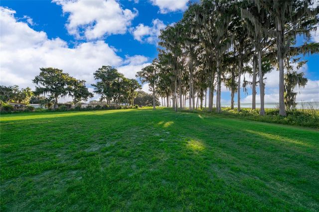 12131 EAGLES POINT COURT, Grand Island, FL 32735