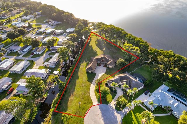 12131 EAGLES POINT COURT, Grand Island, FL 32735
