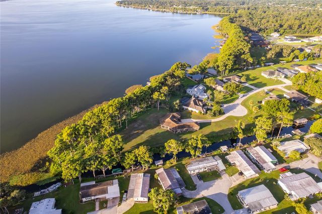 12131 EAGLES POINT COURT, Grand Island, FL 32735
