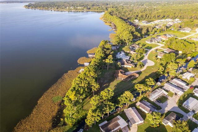 12131 EAGLES POINT COURT, Grand Island, FL 32735