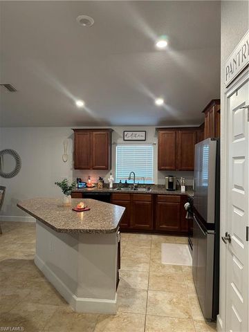 573 Windermere DR, Lehigh Acres, FL 33972