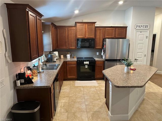 573 Windermere DR, Lehigh Acres, FL 33972