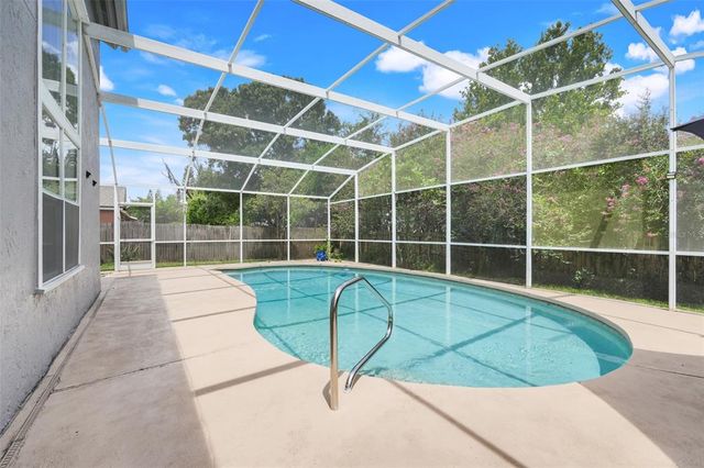 7938 TUMBLESTONE DRIVE, Orlando, FL 32819