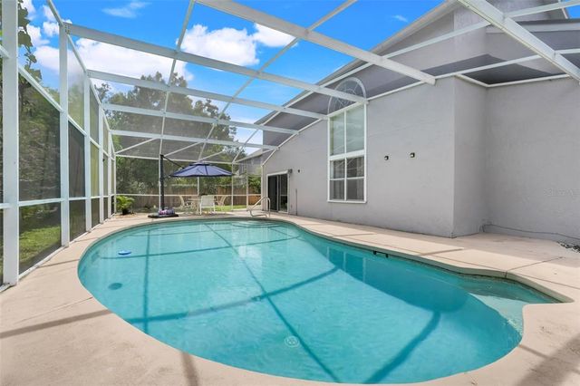 7938 TUMBLESTONE DRIVE, Orlando, FL 32819