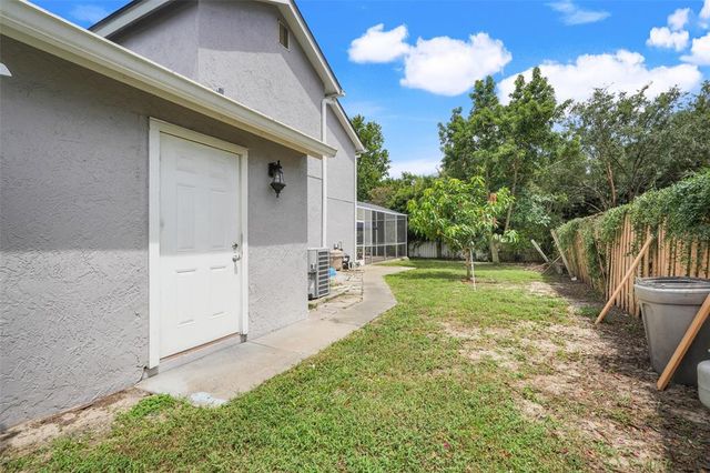 7938 TUMBLESTONE DRIVE, Orlando, FL 32819