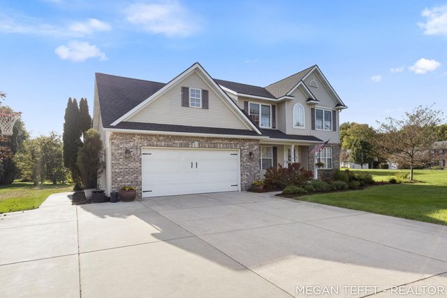 9107 Lady Lauren Drive NE, Rockford, MI 49341