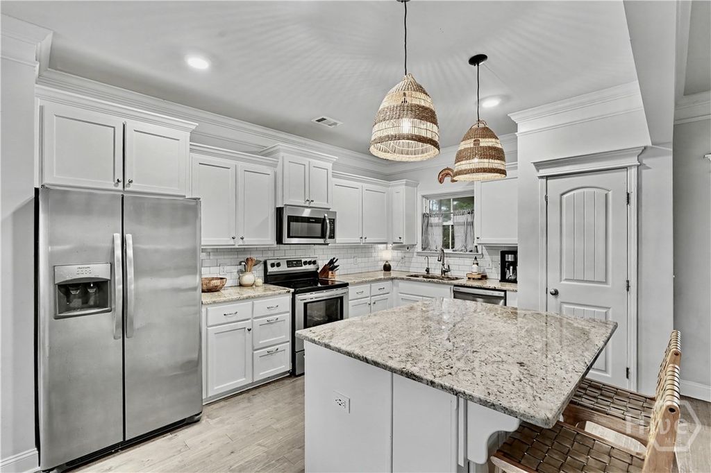 Image 2 of property listing at 67 Shortleaf Trail, Richmond Hill, GA 31324