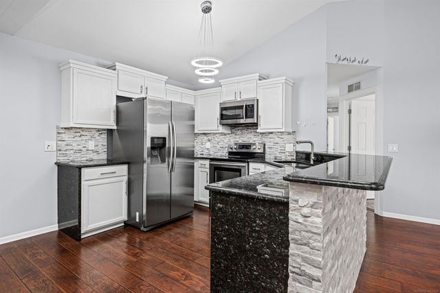 49143 W WOODS Drive, Shelby Twp, MI 48317