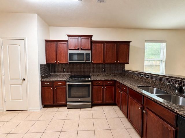 8739 Leclaire Meadow Drive, Humble, TX 77338