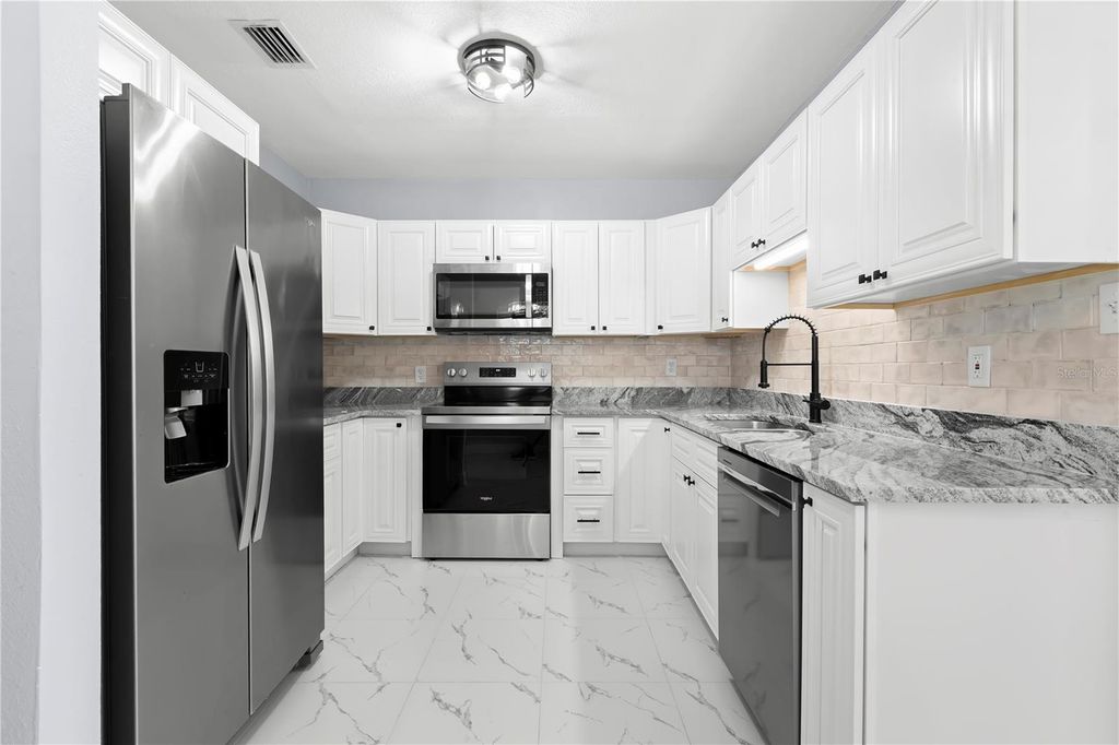 Image 4 of property listing at 3921 W GRAY STREET, Tampa, FL 33609