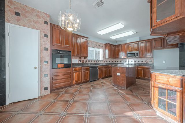 9407 Demsey Mill Drive, Sugar Land, TX 77498