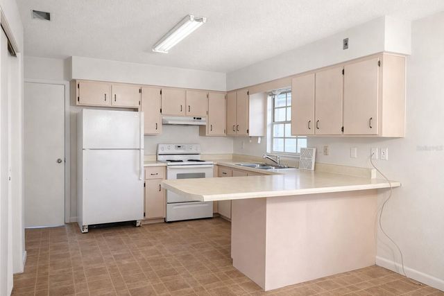 11836 ORANGE STREET, San Antonio, FL 33576