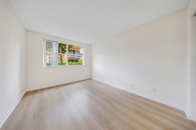 8977 Wiles Road 102, Coral Springs, FL 33067