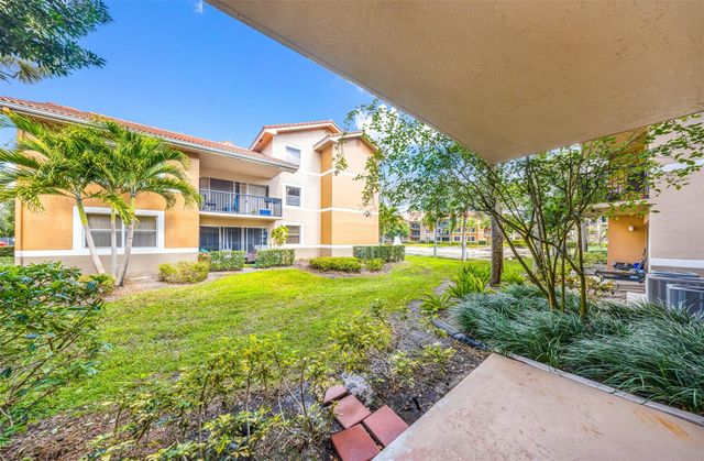 8977 Wiles Road 102, Coral Springs, FL 33067