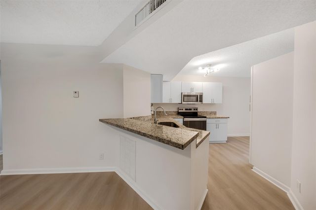 8977 Wiles Road 102, Coral Springs, FL 33067