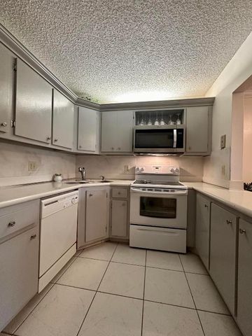 5991 Whispering Pine Way C-2, Greenacres, FL 33463