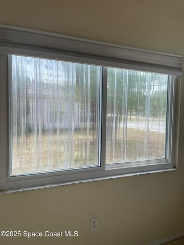 882 Wateroak Drive NE Port Malabar Unit 59, Palm Bay, FL 32905