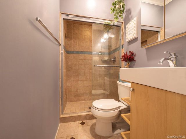 8719 57th Road 77, Elmhurst, NY 11373