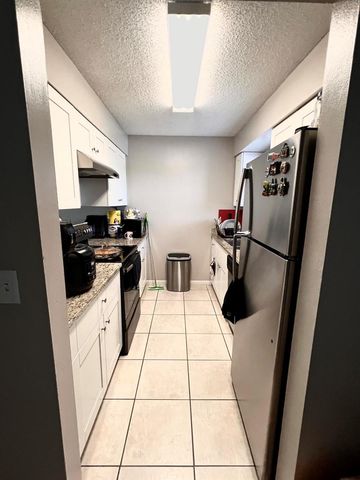 2606 CANALSIDE Drive, Greenacres, FL 33463
