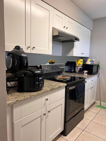 2606 CANALSIDE Drive, Greenacres, FL 33463