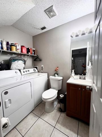 2606 CANALSIDE Drive, Greenacres, FL 33463