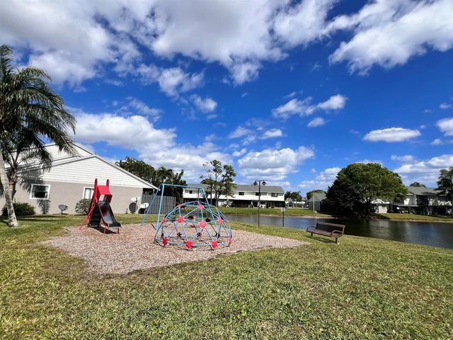 2606 CANALSIDE Drive, Greenacres, FL 33463