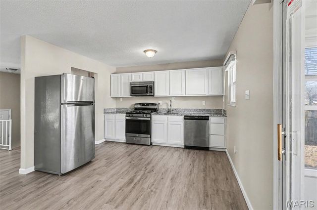 11983 Holly Brook Drive, Maryland Heights, MO 63043