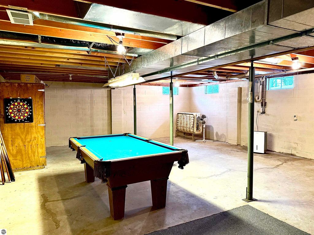 Image 16 of property listing at 6547 Birch Lake Road, Kewadin, MI 49648