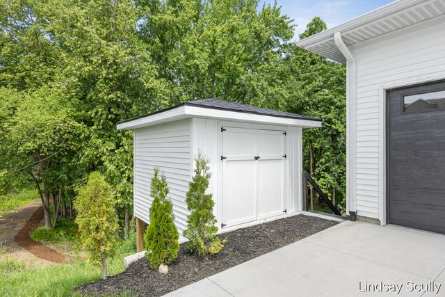 9465 Wabasis Pointe Drive Ne, Oakfield Twp, MI 48838