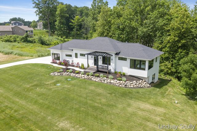 9465 Wabasis Pointe Drive Ne, Oakfield Twp, MI 48838