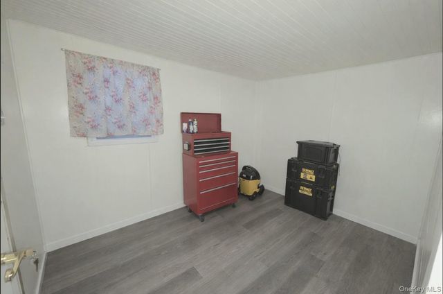 525 Riverleigh Ave C7, Riverhead, NY 11901