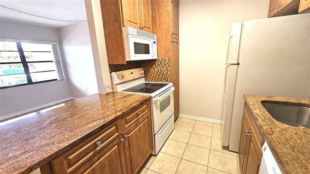 8 QUAILS RUN BOULEVARD 3, Englewood, FL 34223