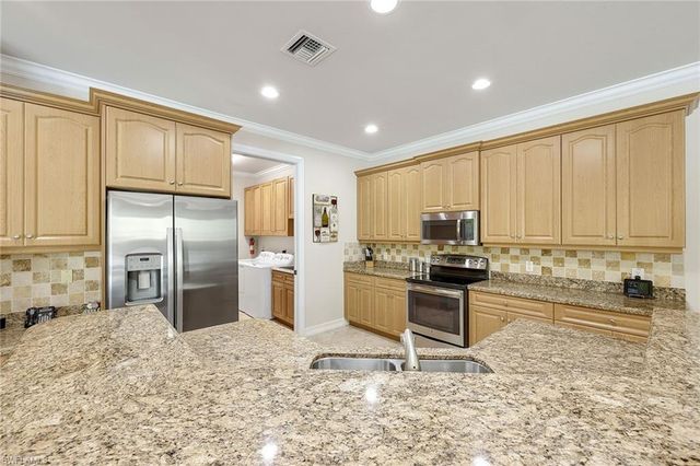 65 Heritage WAY, Naples, FL 34110