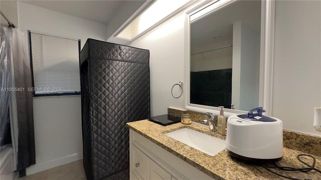 323 W Canterbury Dr W, Riviera Beach, FL 33407