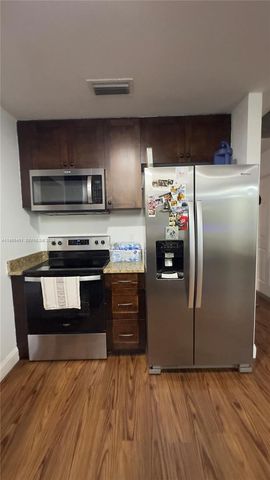 323 W Canterbury Dr W, Riviera Beach, FL 33407