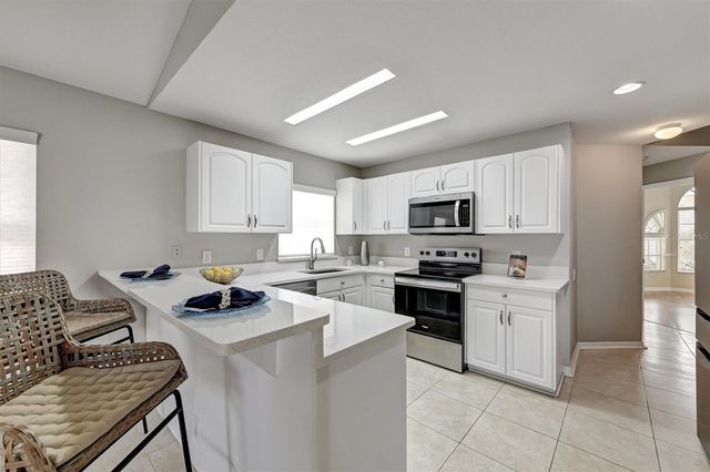 1272 JASMINE LAKE DRIVE, Tarpon Springs, FL 34689