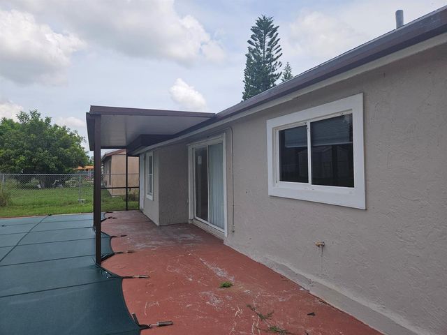252 SW Cherryhill Road, Port St. Lucie, FL 34953