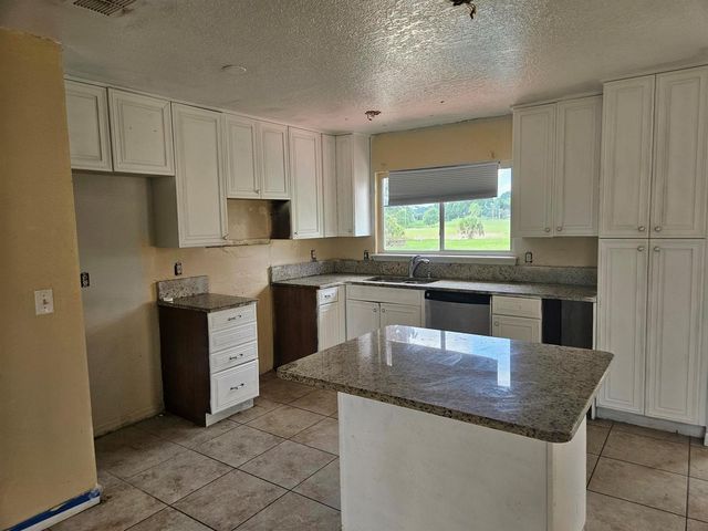 252 SW Cherryhill Road, Port St. Lucie, FL 34953