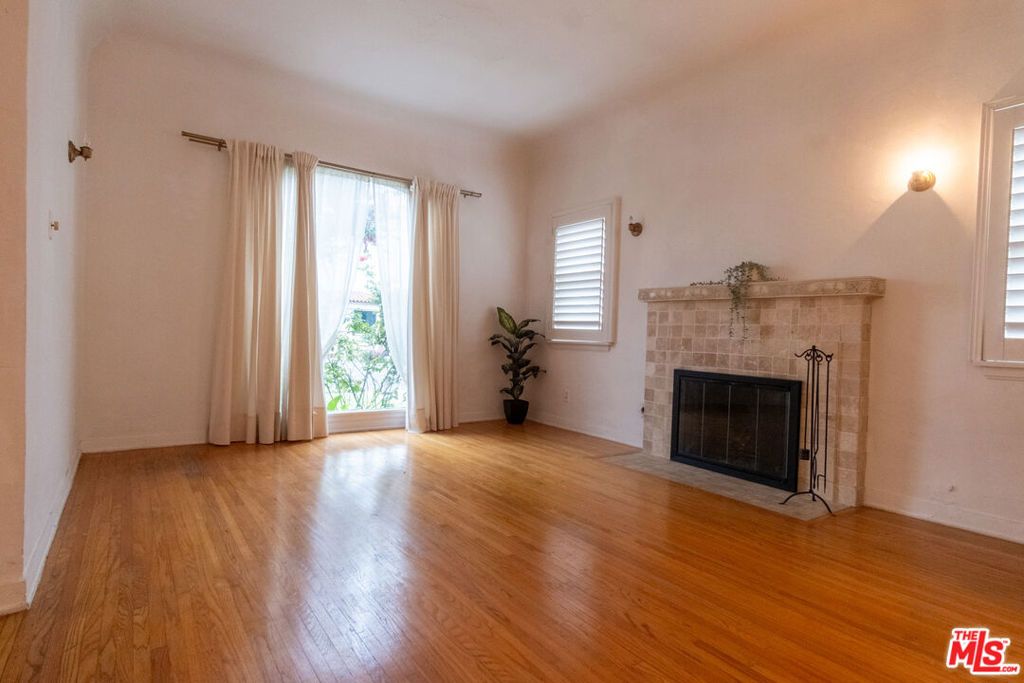 Image 1 of property listing at 8714 S Wilton Place, Los Angeles, CA 90047