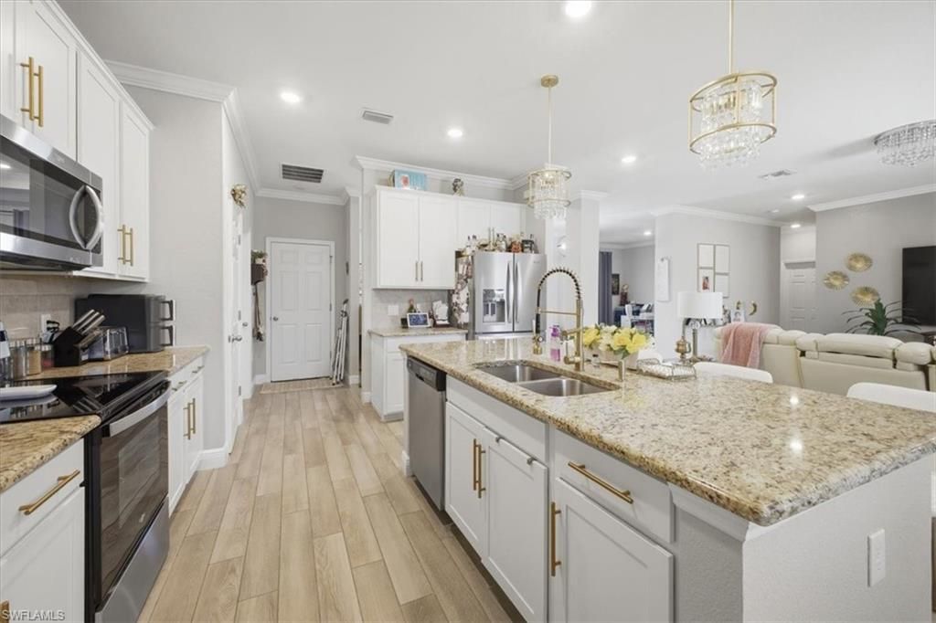 Image 10 of property listing at 1025 7th PL, Cape Coral, FL 33993
