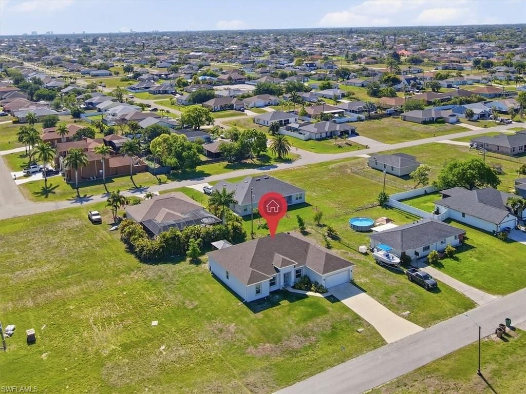 Image 3 of property listing at 1025 7th PL, Cape Coral, FL 33993