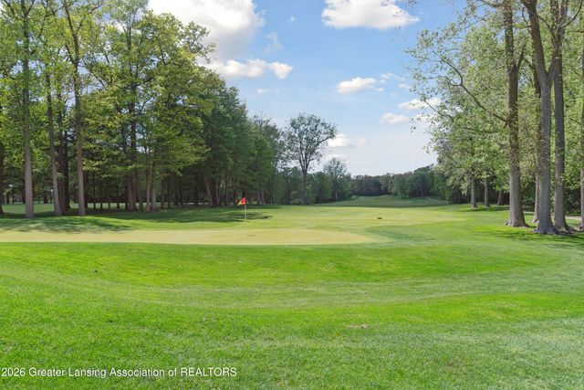 15599 Club Course Drive, Bath, MI 48808