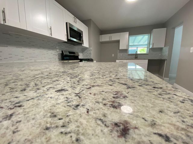 9121 Bamboo Drive, Palm Beach Gardens, FL 33410