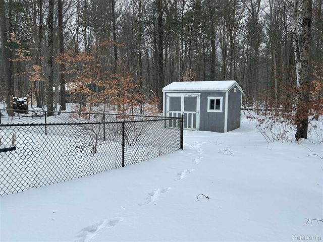 9642 Hummingbird Ct, Reynolds Township, MI 49329