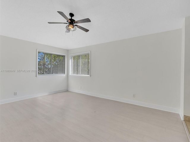 11407 S Lakeview Dr, Coral Springs, FL 33071