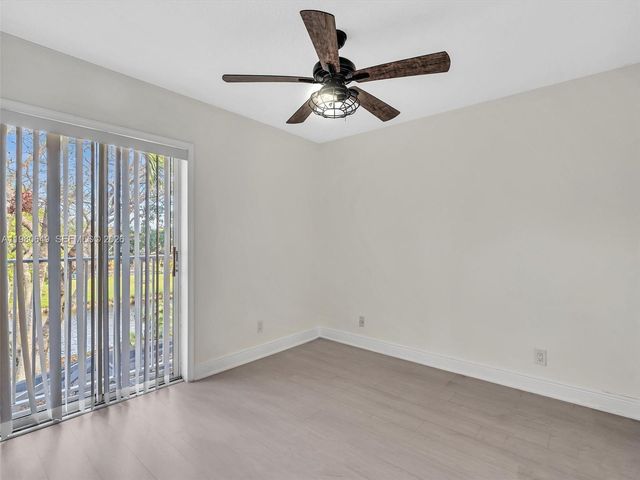 11407 S Lakeview Dr, Coral Springs, FL 33071