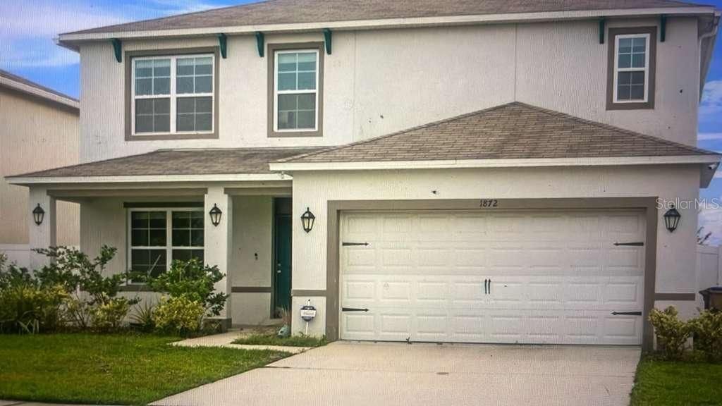 Image 1 of property listing at 1872 RUSTIC FALLS DRIVE, Kissimmee, FL 34744
