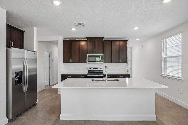 883 SUNSHOWER DRIVE, Lady Lake, FL 32159