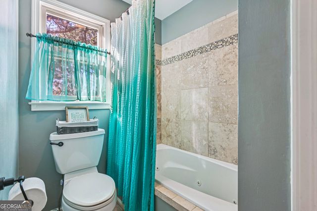 701 Whisper Wind Court, Woodstock, GA 30189