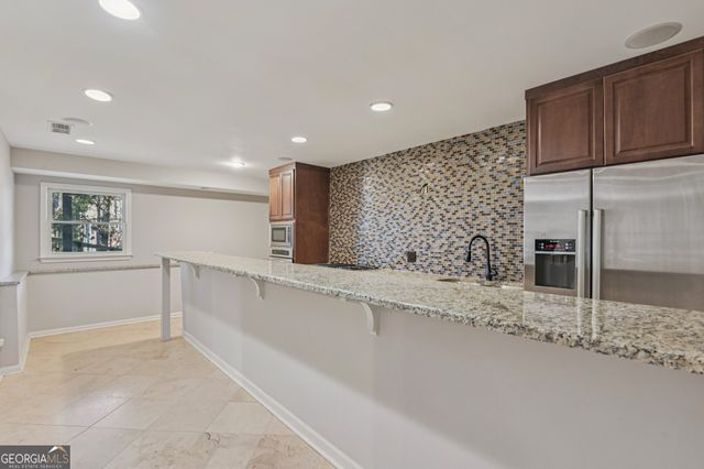 701 Whisper Wind Court, Woodstock, GA 30189